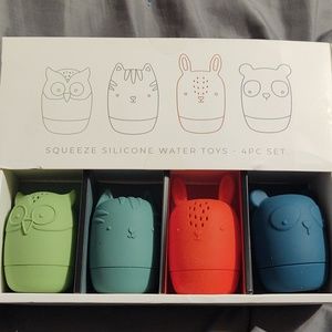NIB- Squeeze Silicone Water Toys - 4 piece set.